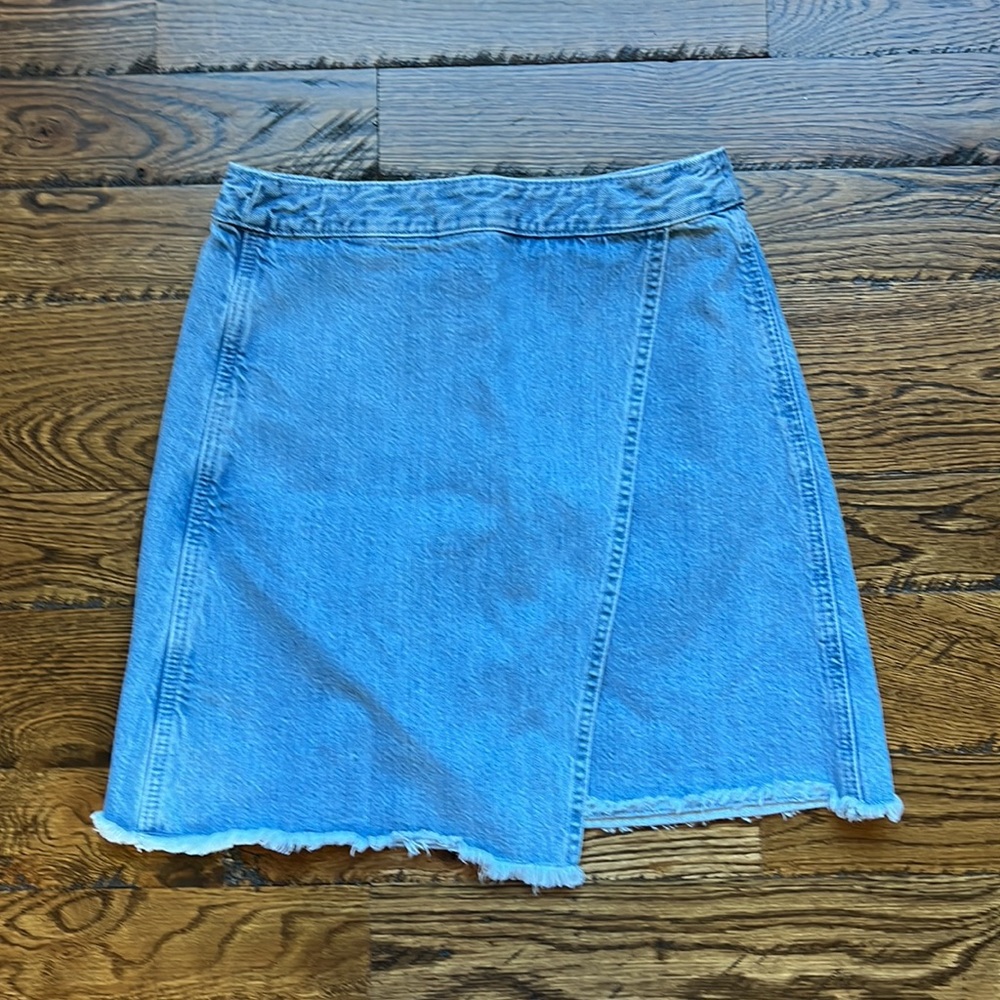 LOFT a-line denim light wash skirt with rough hem, size 0 (25). Length 17”.